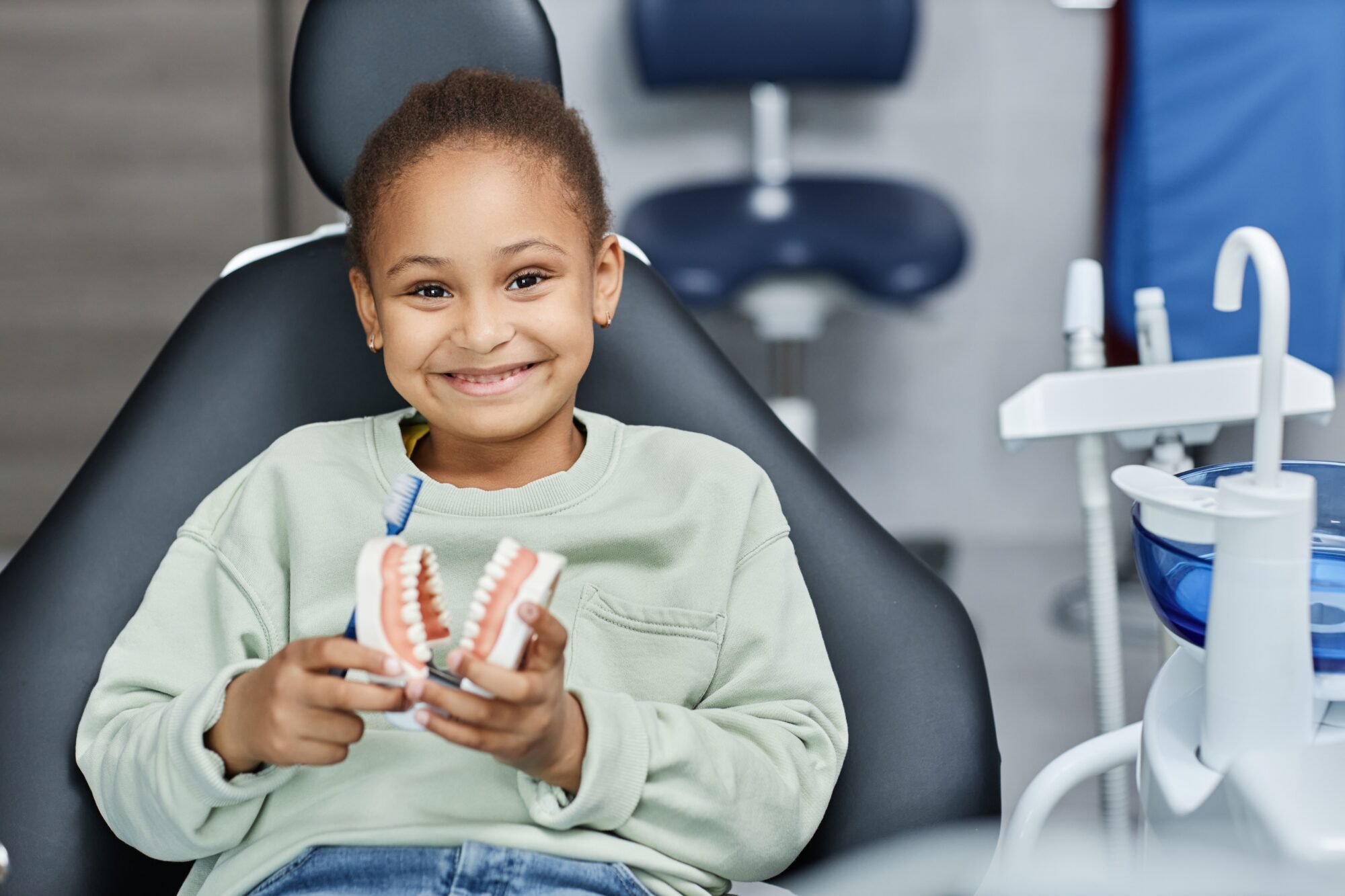 Front,View,Portrait,Of,Black,Little,Girl,In,Dental,Chair